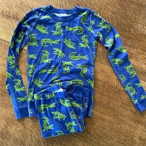 Hannah Andersson Vintage Green Alligator on Spectrum Blue.
